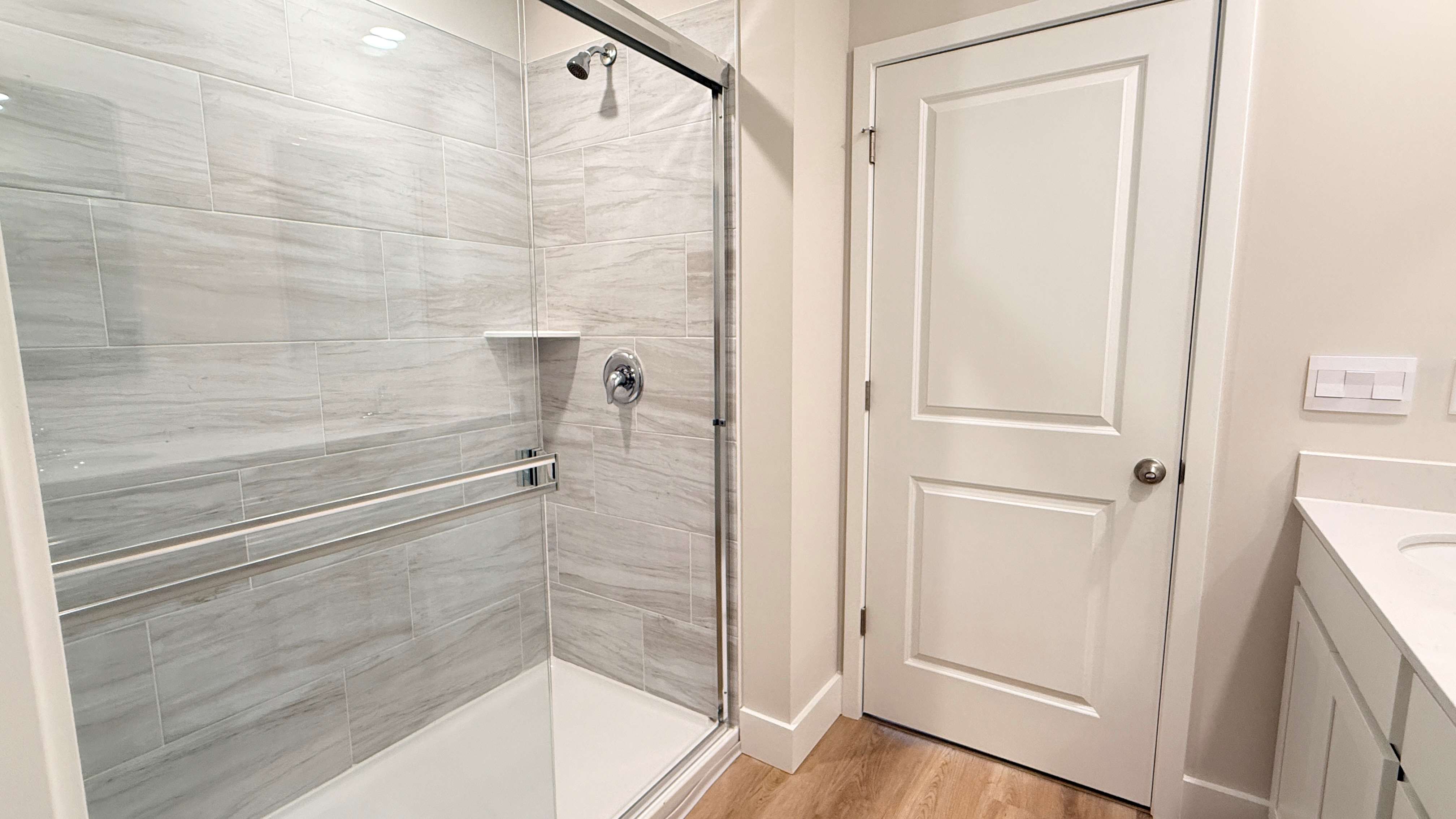 Primary bath tiled shower.