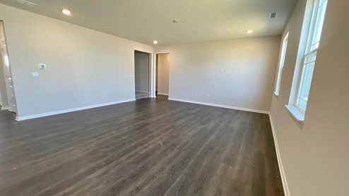 Great room with laminate flooring