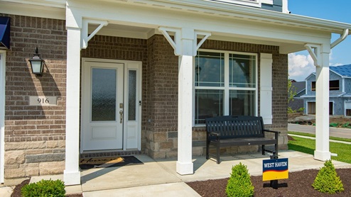 Welcoming entry and ocevered front porch