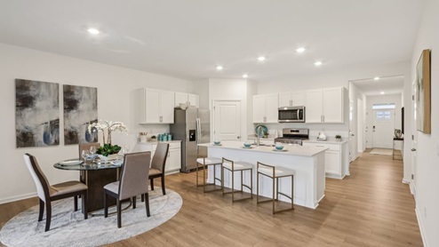 open concept kitchen and dining