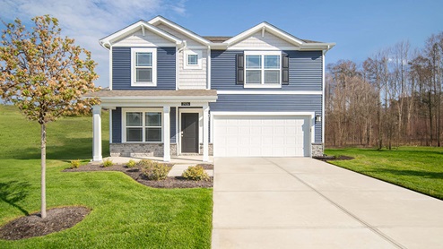 two story home with front porch and 2 car garage