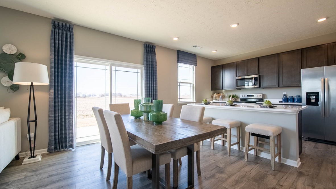 open concept kitchen and dining space