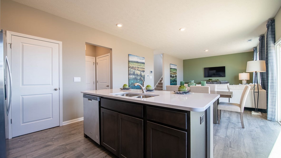 open concept kitchen dining and living area