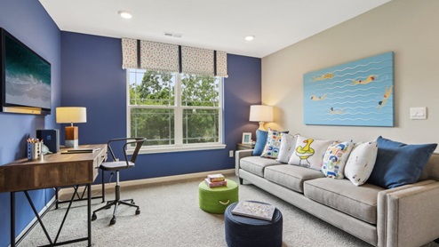 Simple upper floor landing with neutral tones and natural light.