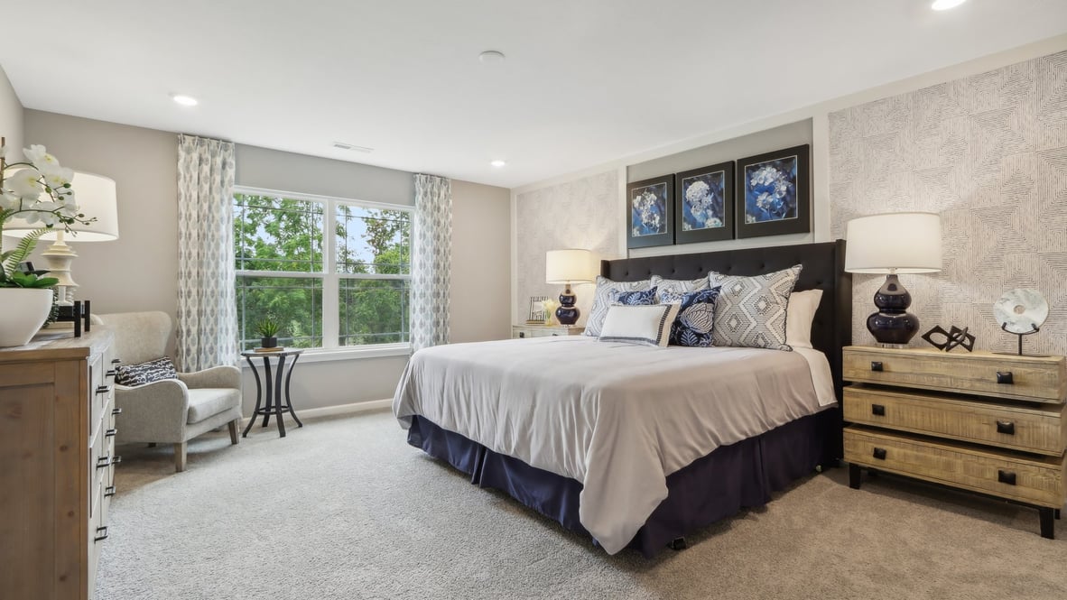 primary bedroom with large windows