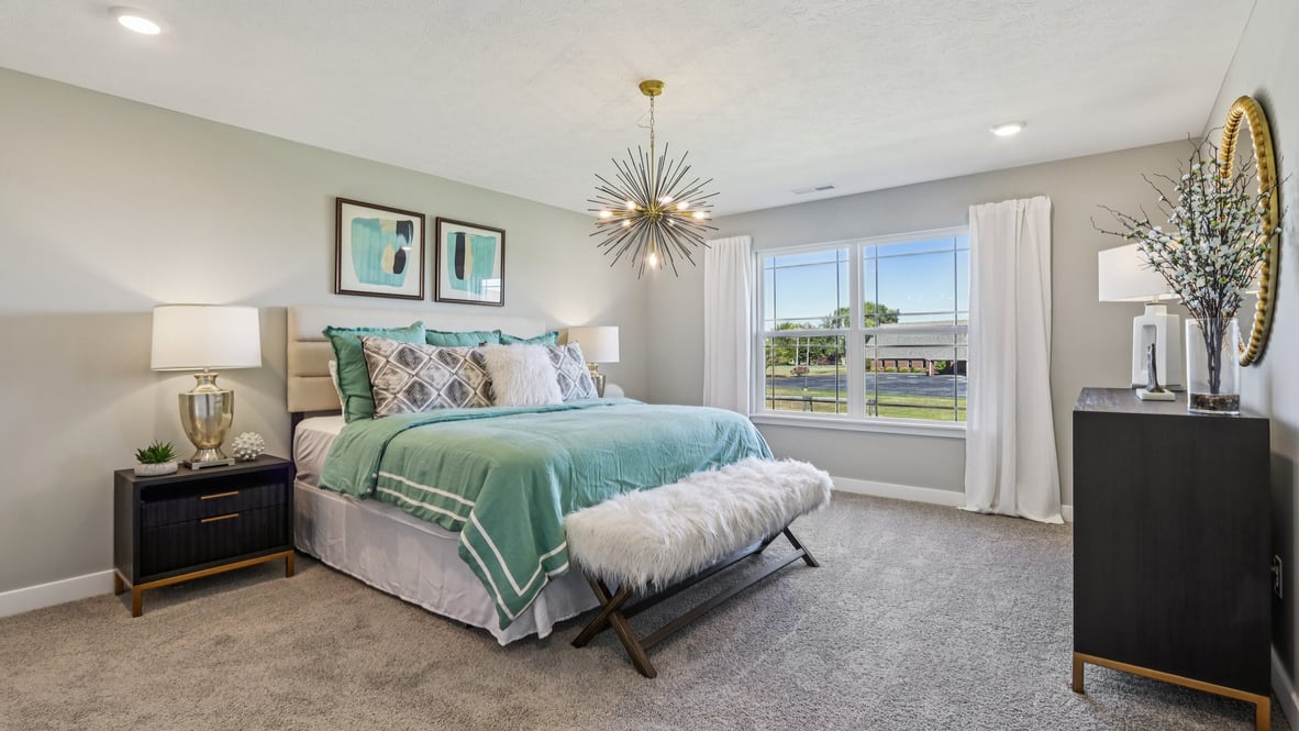primary bedroom with large windows