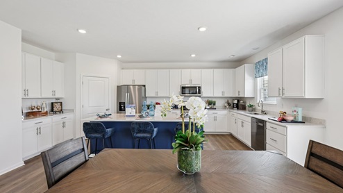 Interior dining area open to kitchen