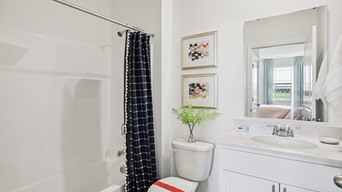 Interior bathroom with sink and full-sized shower