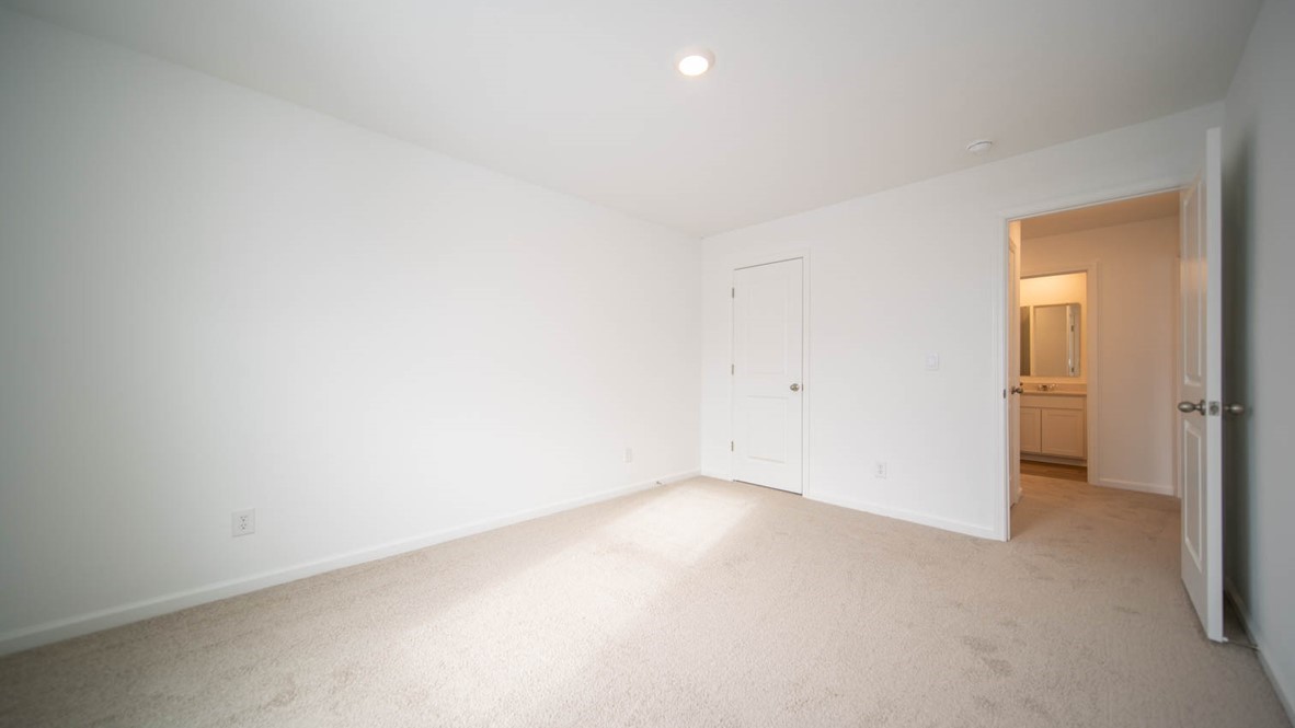 bedroom 2 with large windows