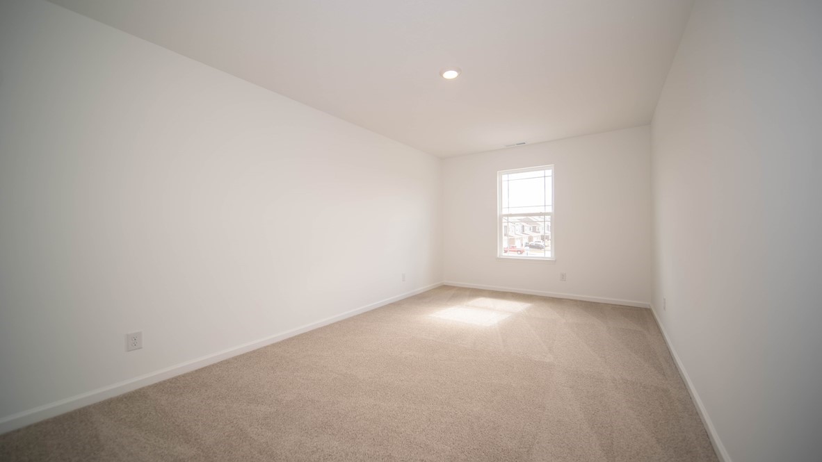 bedroom 3 with large windows