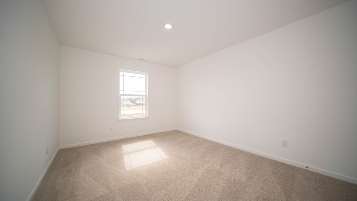 bedroom 2 with large windows