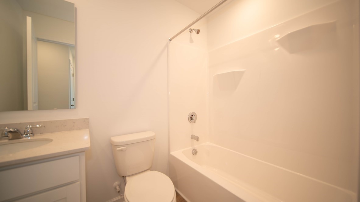 bathroom with shower and tub combo