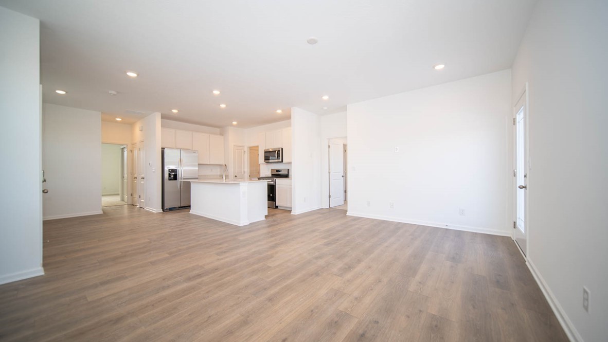 Open-concept great room and dining area.