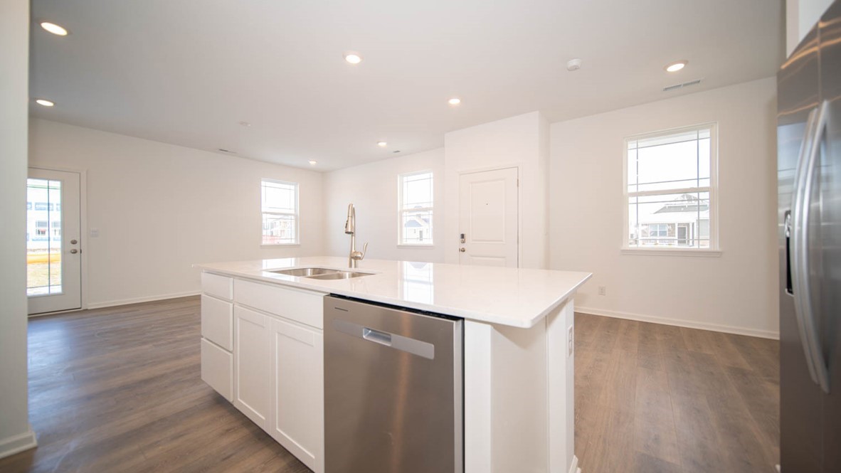 Open-concept kitchen and dining area.
