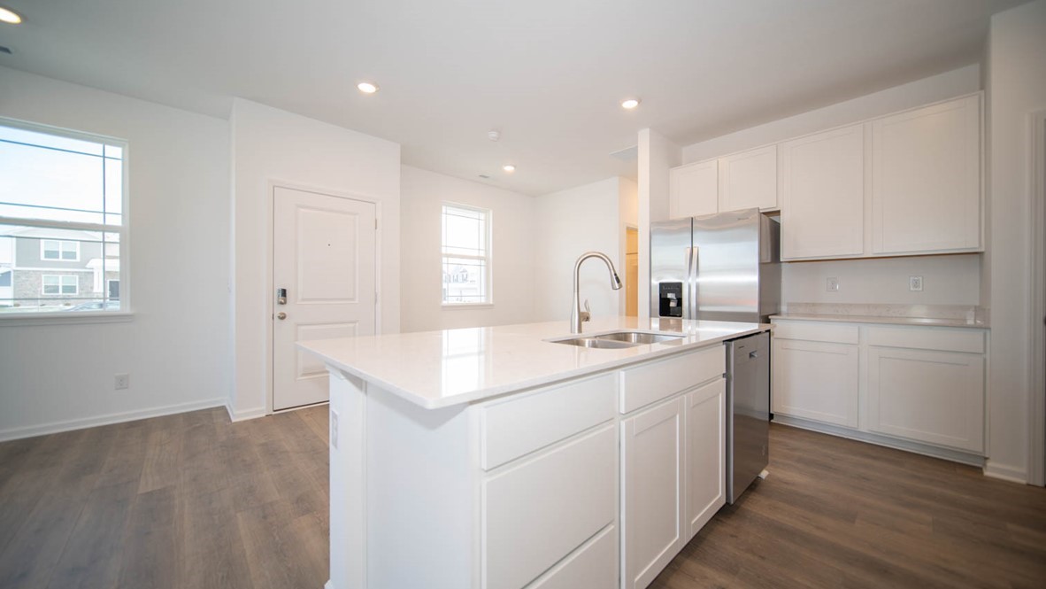 Kitchen across from entry door.