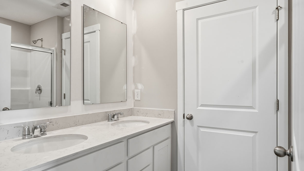 primary bathroom with two sinks