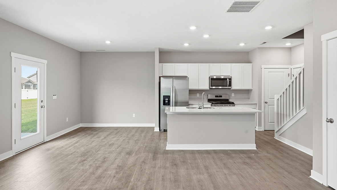 kitchen and dining room with natural light