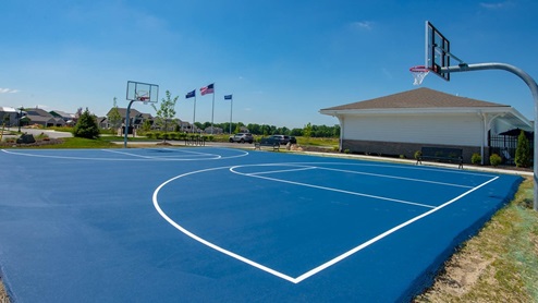 Outdoor basketball court at the amenity center.