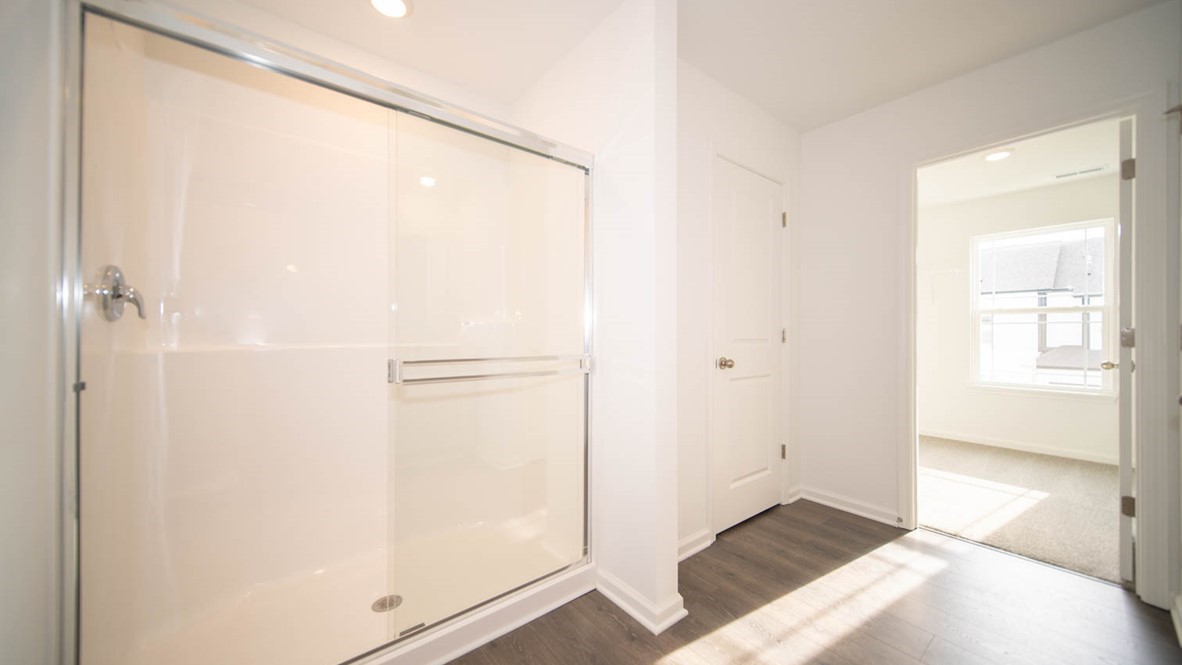primary bathroom with walk-in shower