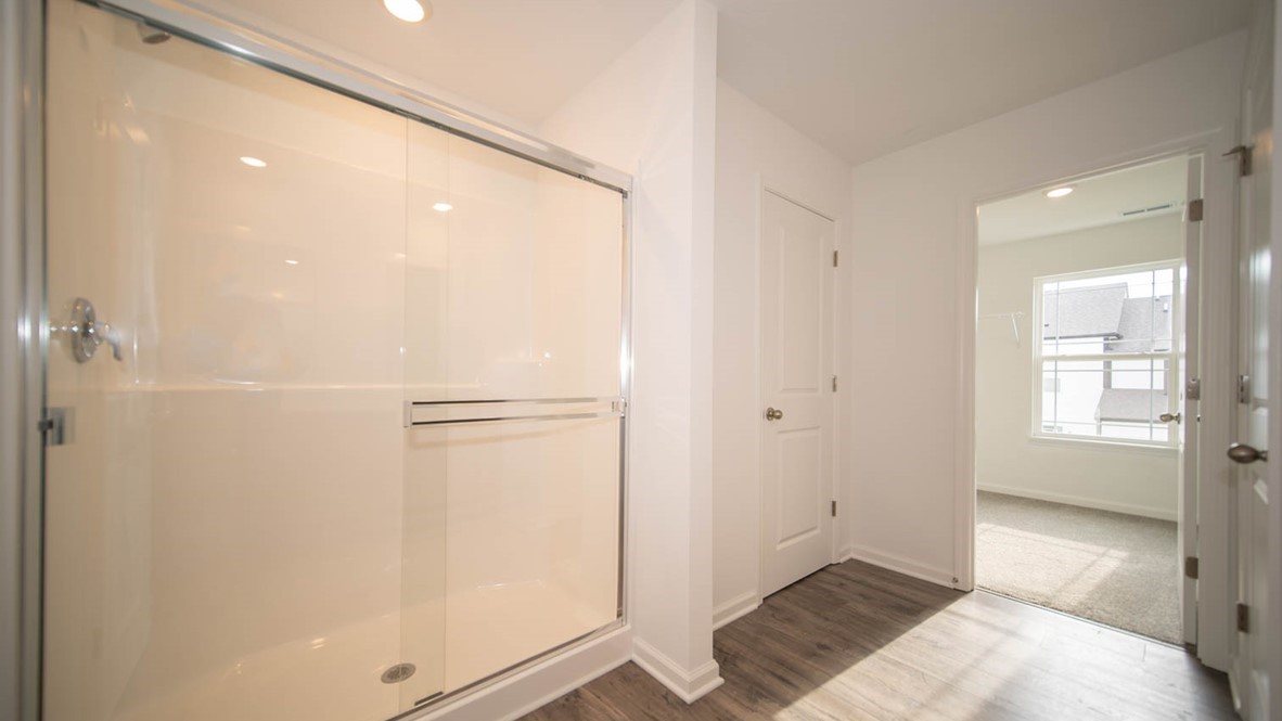 primary bathroom with walk-in shower