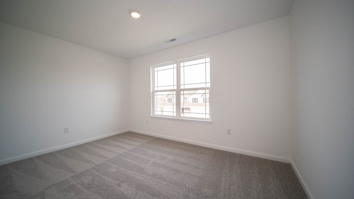 bedroom 2 with large windows