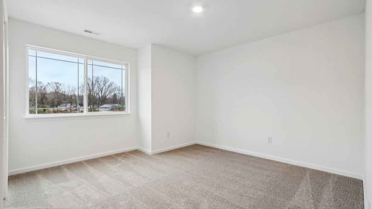 bedroom with large windows