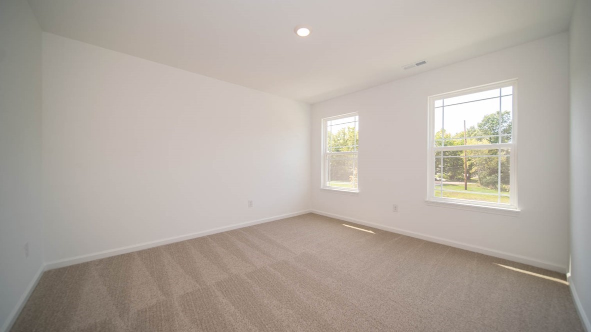 bedroom 2 with large windows
