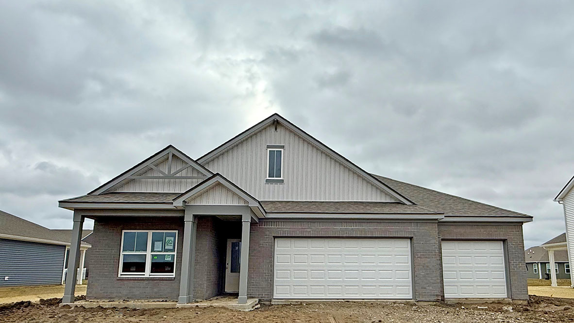 one-story home with 3-car garage in trailside