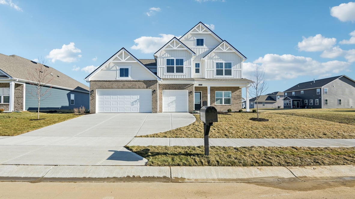 two-story home in trailside with 3-car garage