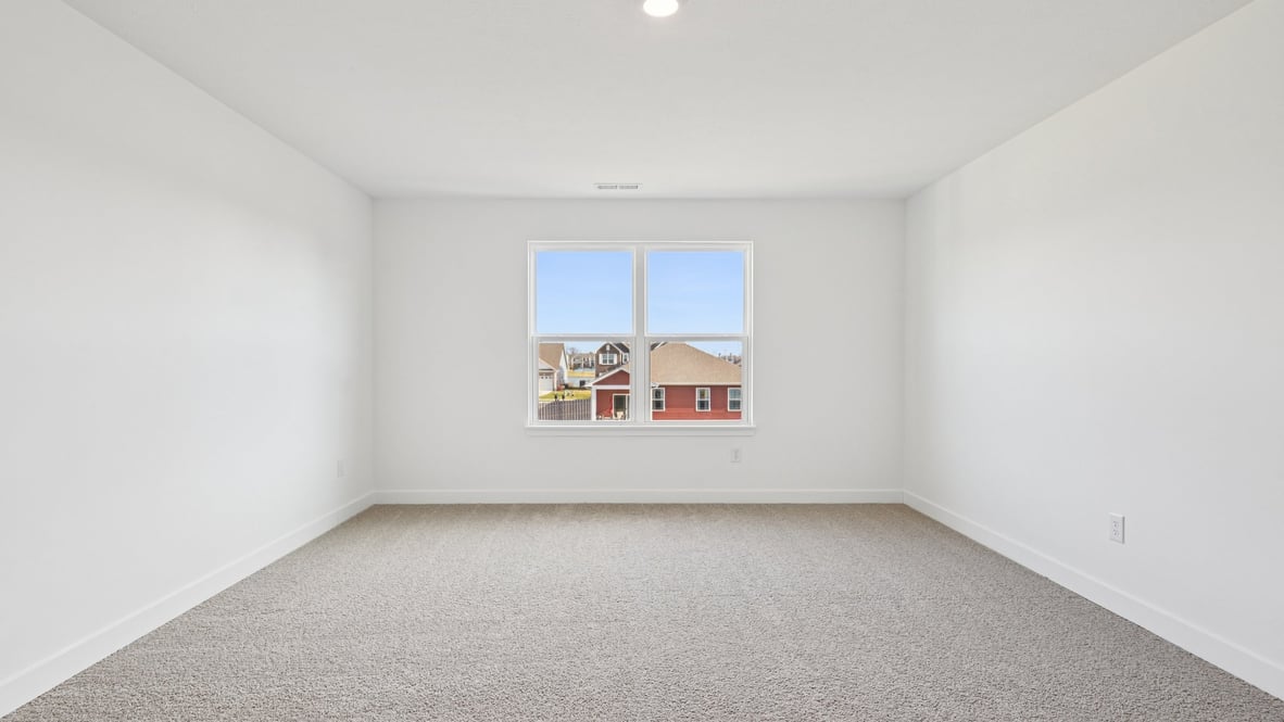 primary bedroom with large windows