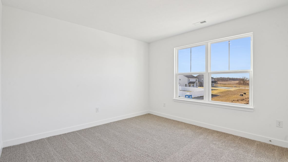bedroom with large windows