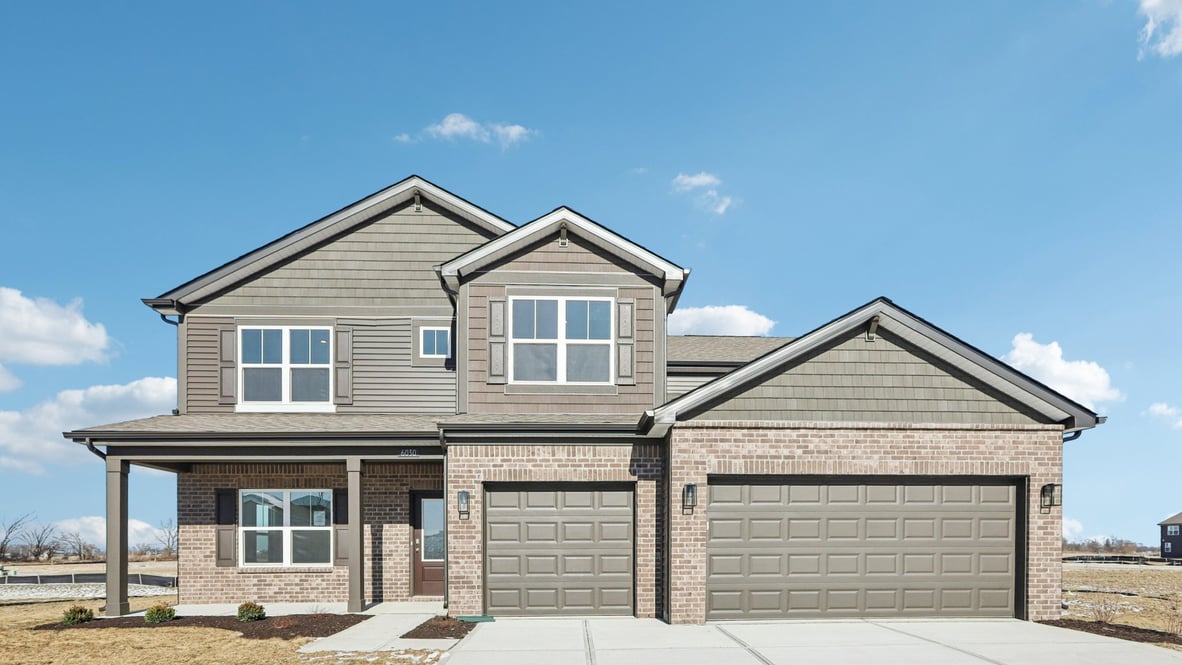 two-story home in trailside with 3-car garage