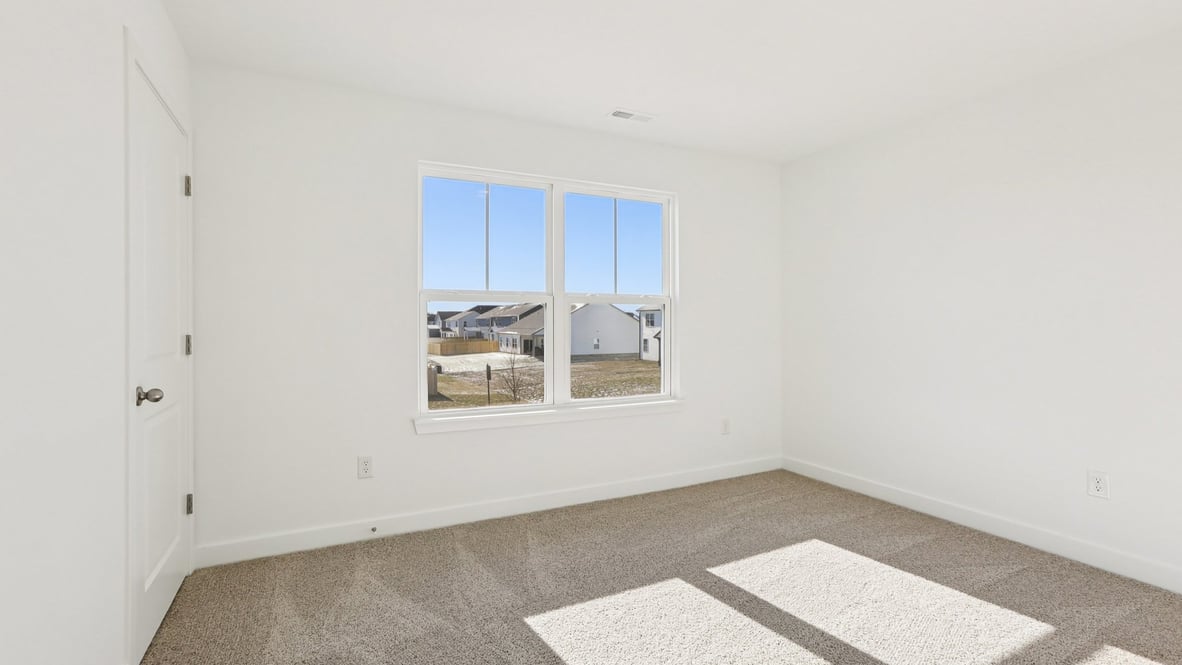 bedroom with large windows