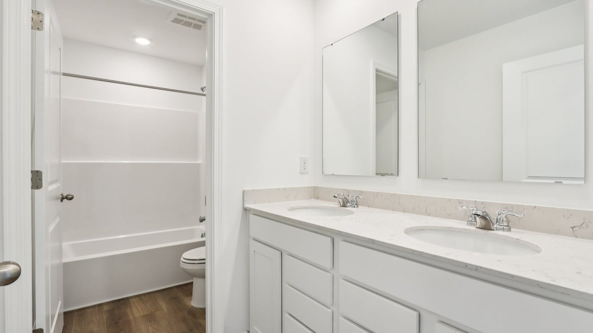 bathroom with dual vanity