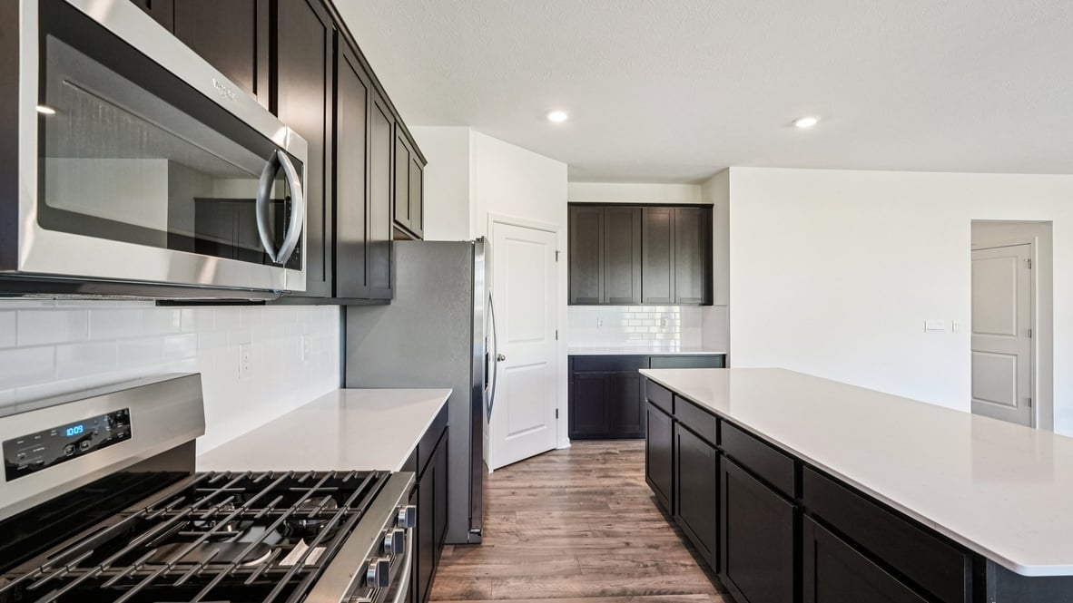 kitchen with large corner pantry