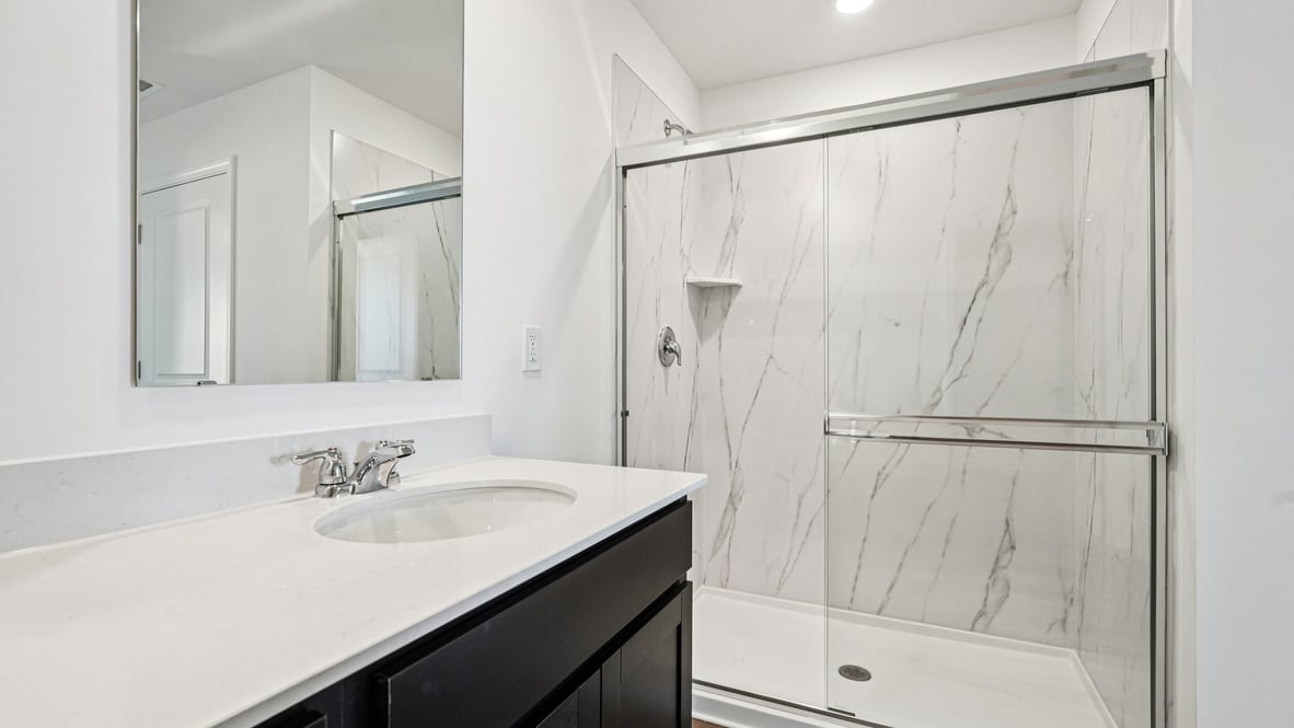 primary bathroom with walk-in shower