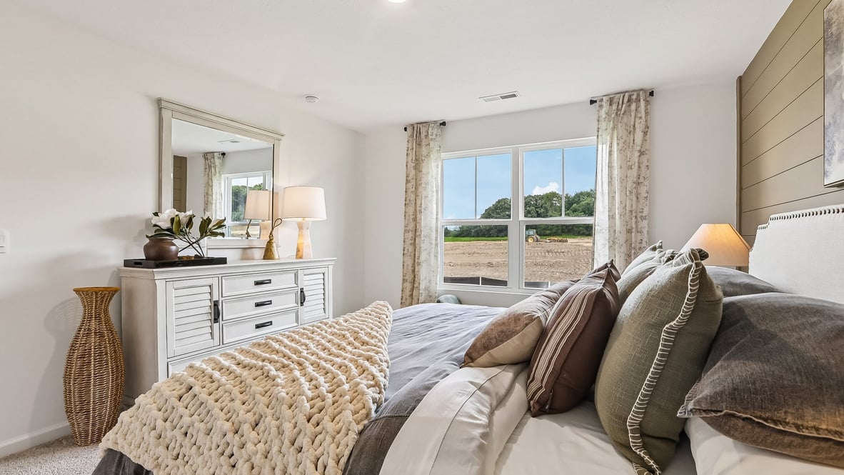 primary bedroom with natural light