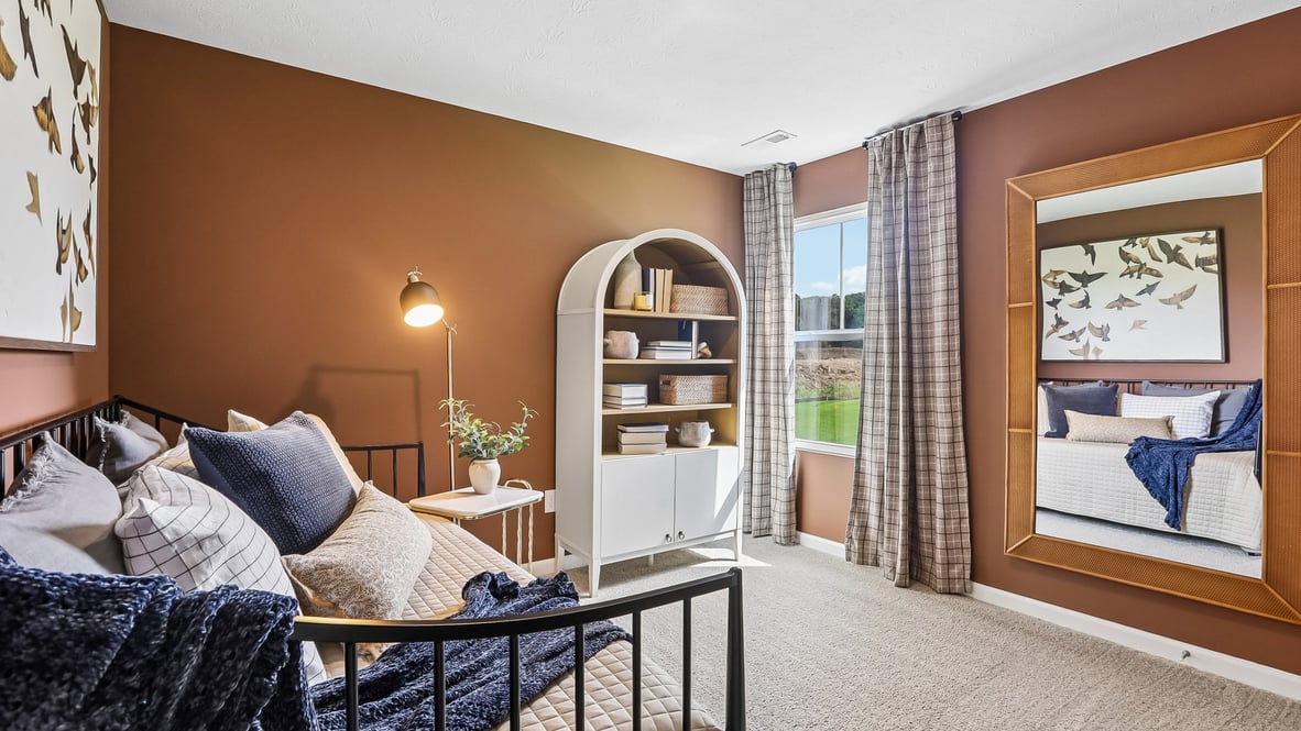 bedroom with window in the corner