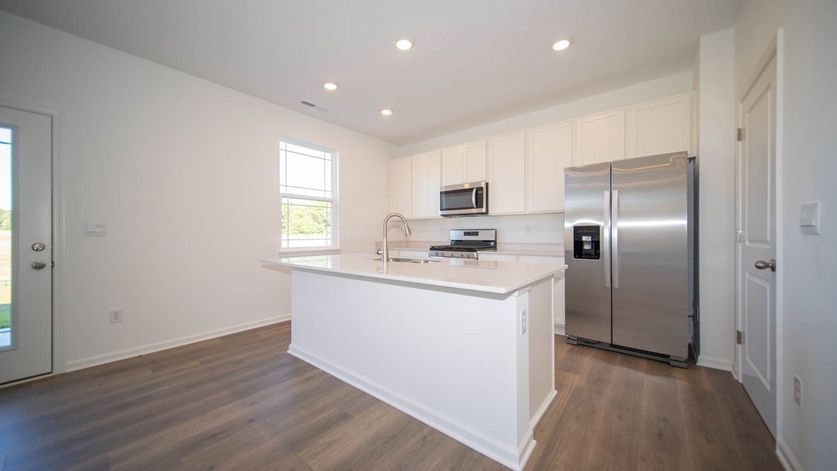kitchen with white cabinets