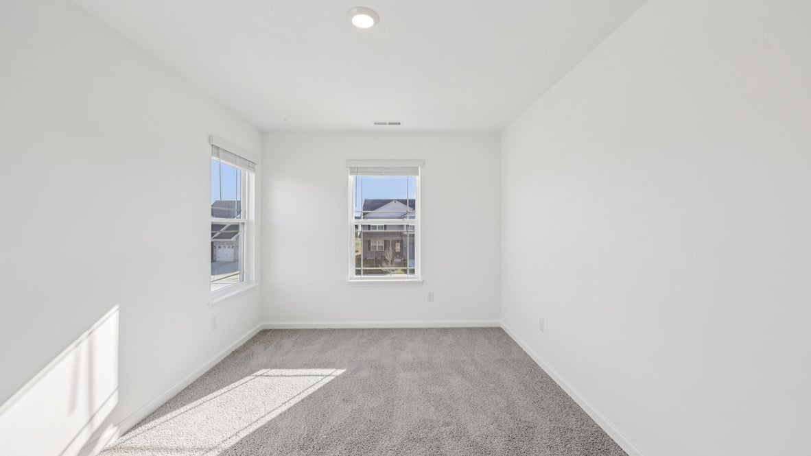 bedroom with large windows