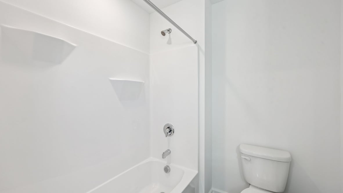bathroom with shower and tub combo