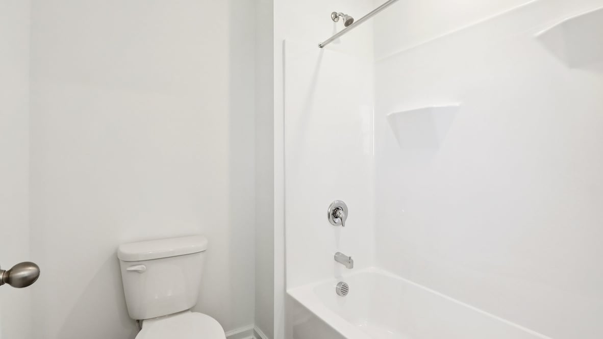 bathroom with shower and tub combo