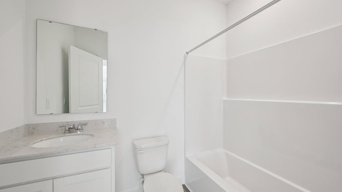 bathroom with shower and tub combo