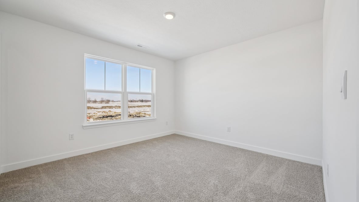 bedroom with large windows