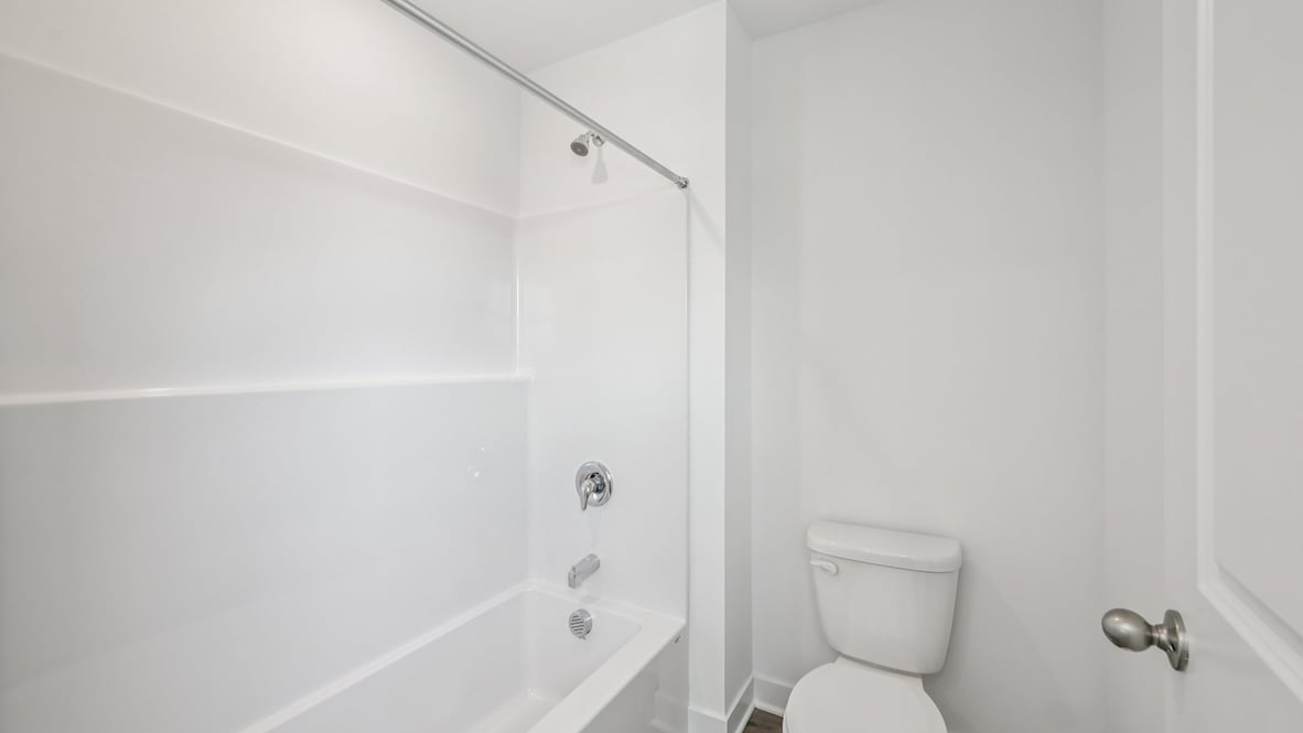bathroom with shower and tub combo