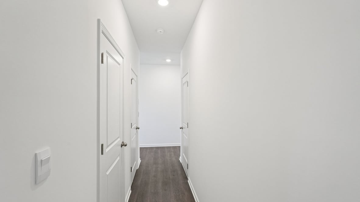 Looking from garage access down hallway Parkview Village