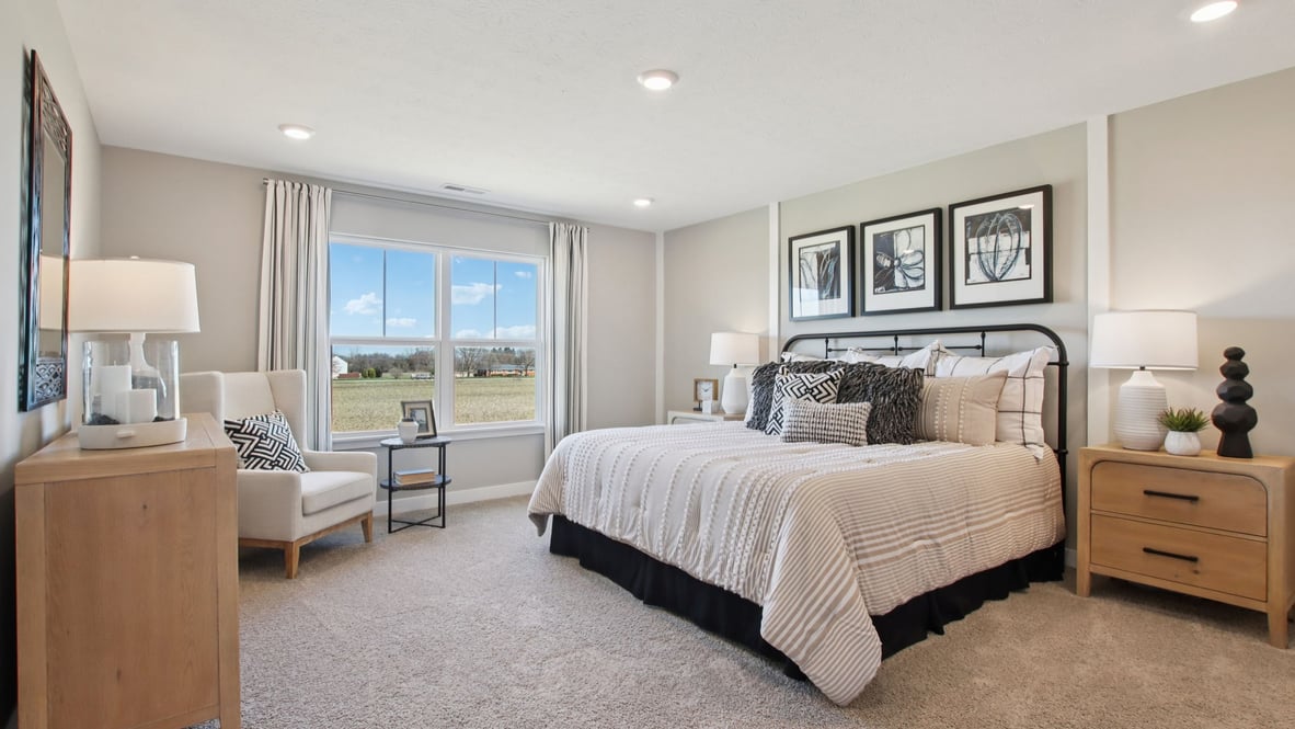 primary bedroom with large windows