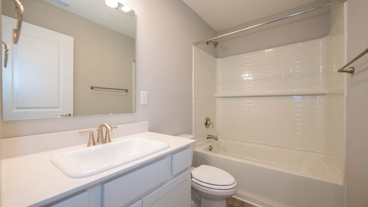 bathroom with shower and tub combo