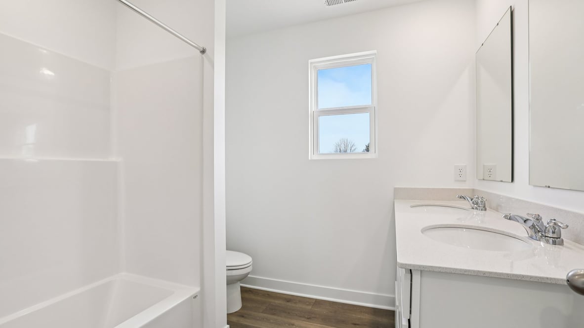 bathroom with shower and tub combo