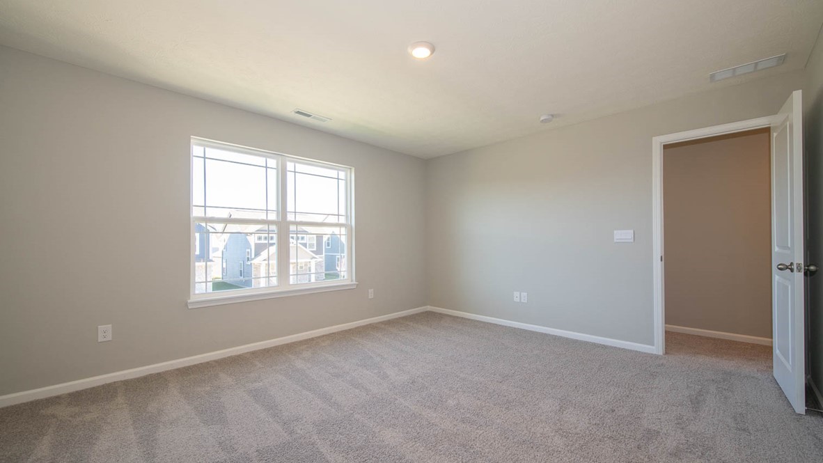 primary bedroom with open-concept
